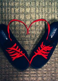 Close-up of shoes on tiled floor