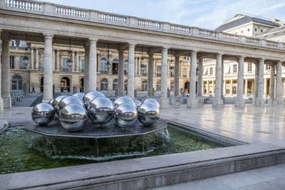 View of fountain in city street