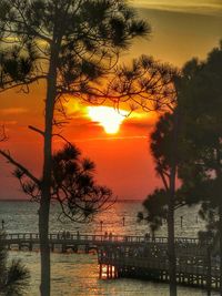 Scenic view of sea at sunset