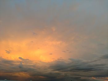 Low angle view of clouds in sky during sunset