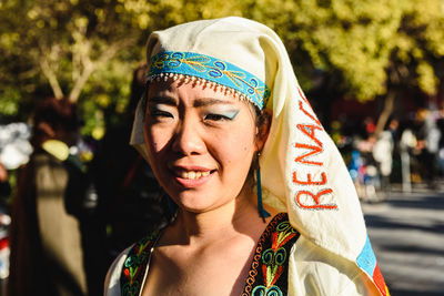 Close-up portrait of a smiling young woman