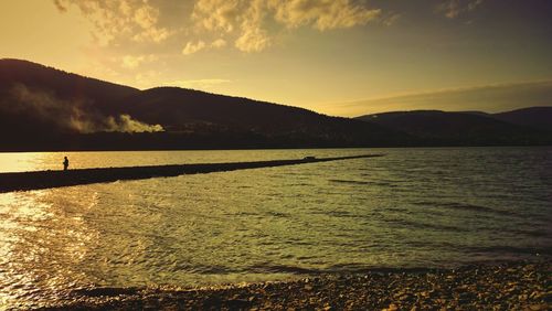 Scenic view of mountains at sunset