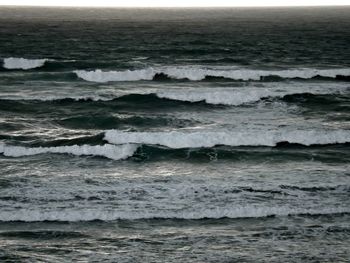 Waves splashing on shore