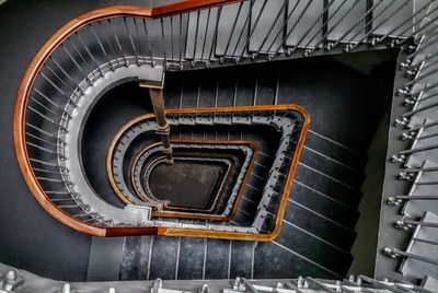 Directly below shot of spiral staircase in building