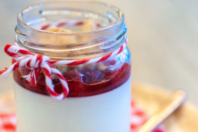 Close-up of glass of jar on table