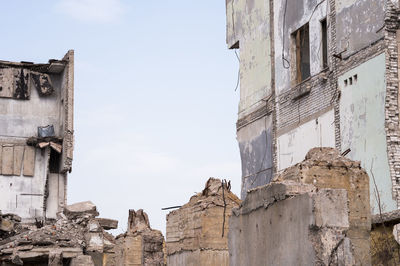 Low angle view of old building against sky