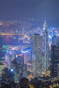 Illuminated buildings in city at night