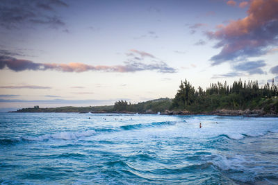 Scenic view of sea against blue sky