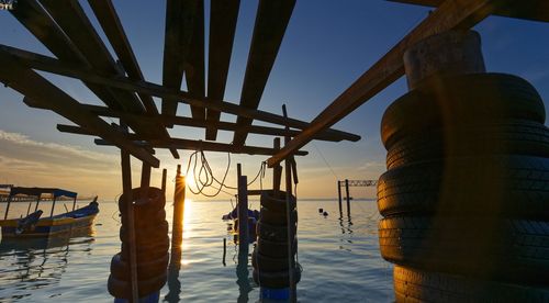 Scenic view of sea against clear sky during sunset