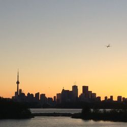 View of cityscape against sky during sunset