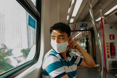 Portrait of boy in train