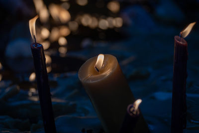 Close-up of illuminated candle