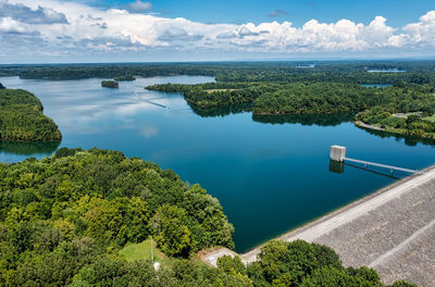 A drone photo over a dam and a lake. tims ford in winchester tennessee