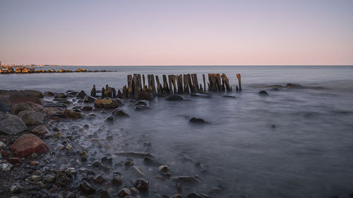 Scenic view of sea against sky during sunset