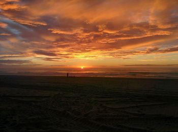 Scenic view of sea at sunset