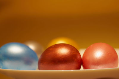 Close-up of eggs against white background