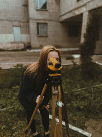 Portrait of young woman outdoors