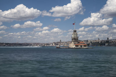 View of sea with buildings in background