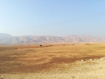 Scenic view of desert against sky