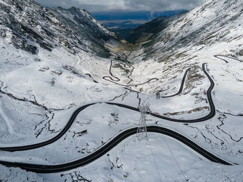 The winding transfagarasan highway with snow