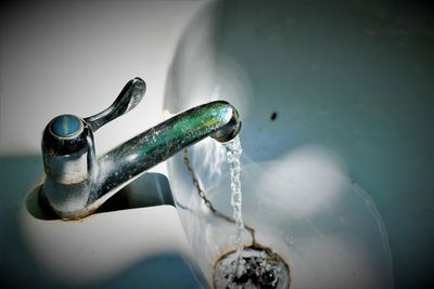 Close-up of faucet in bathroom