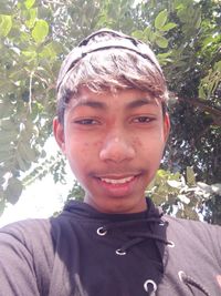 Portrait of teenage boy smiling