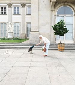 Woman with dog in park