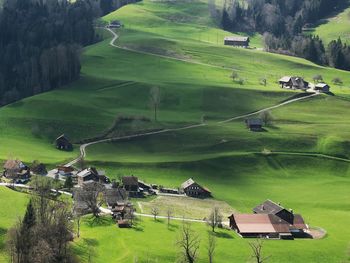 High angle view of houses on field