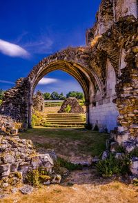 Archway of historic building against sky