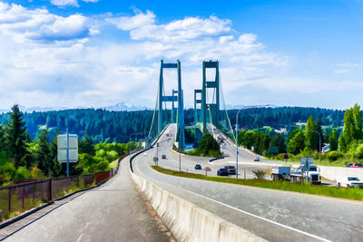 Two suspension bridges known as the narrows bridge in tacoma, washington.
