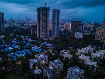 High angle view of buildings against sky in city