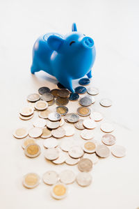 Close-up of coins on white background