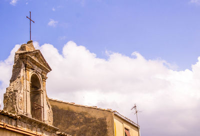 Low angle view of historic building against sky