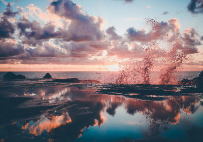 Scenic view of sea against dramatic sky