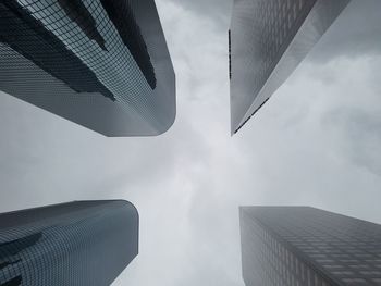 Low angle view of skyscrapers against sky