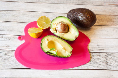 High angle view of fruits in plate on table