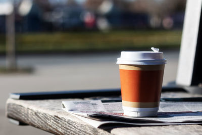 Close-up of coffee cup on table