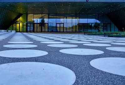 Surface level of footpath amidst buildings in city