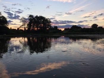 Scenic view of lake during sunset