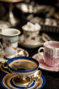 Close-up of coffee cup on table