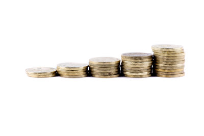 Close-up of stack of objects against white background