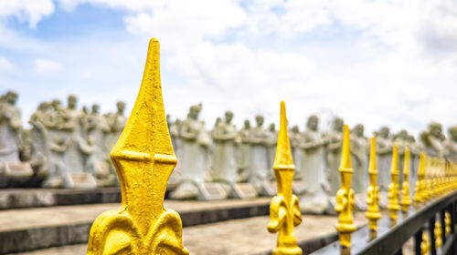 Low angle view of statue against sky