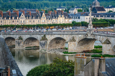 Arch bridge over river