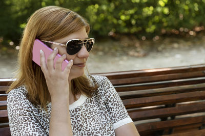 Portrait of woman wearing sunglasses