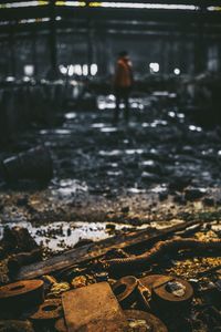 Man walking in water during winter