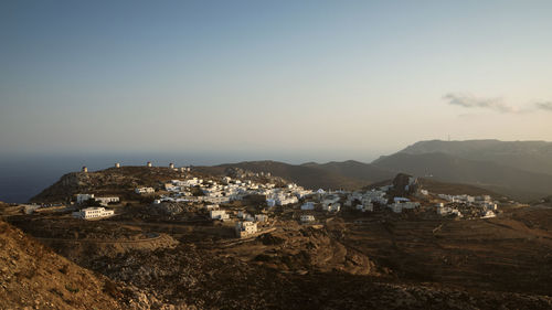 High angle view of buildings in city against clear sky