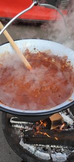 High angle view of meat on barbecue grill