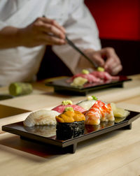 Close-up of sushi on tray