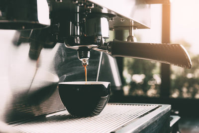 Close-up of coffee cup on table in cafe