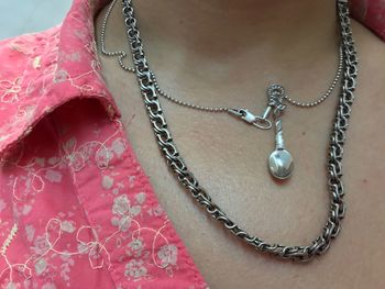 Close-up of woman with necklace